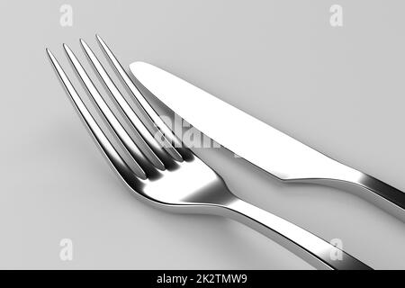 Fork and knife on grey Stock Photo