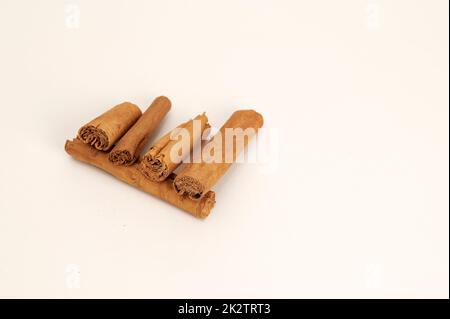 Cinnamon sticks on white Stock Photo