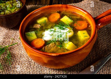 Polish sour cucumber soup with dill Stock Photo