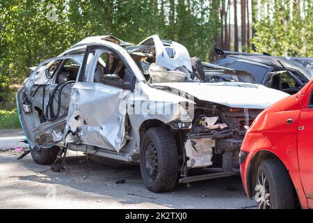 Premium Photo  Many broken cars after a traffic accident in the parking  lot of a restoration service station on the street car body damage workshop  outdoors sale of insurance emergency vehicles