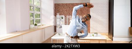 Businessman Doing Exercise Stock Photo