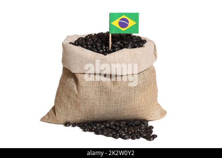 Burlap Bag of Black Beans With Flag of Brazil Isolated on White Background Stock Photo