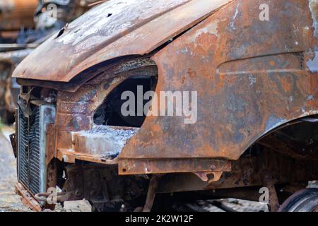 The car was completely destroyed by fire. Abandoned, burnt and rusty ...