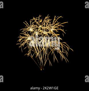 Yellow exploded fireworks isolated on black background Stock Photo