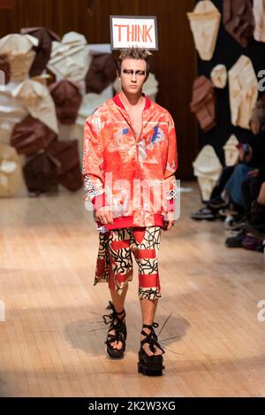 Model, modelling on catwalk for VIN+OMI 'Opinions' show for London Fashion Week 2022. Recycled materials. Sustainable fashion. Stock Photo