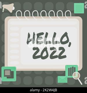 Conceptual display Hello 2022. Word Written on expression or gesture of greeting answering the telephone Blank Open Spiral Notebook With A Calculator And A Pen On Table. Stock Photo