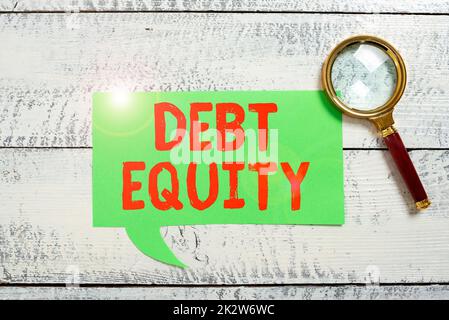 Writing displaying text Debt Equity. Conceptual photo dividing companys total liabilities by its stockholders Lady in suit holding pen symbolizing successful teamwork accomplishments. Stock Photo