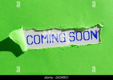 Hand writing sign Coming Soon. Internet Concept something is going to happen in really short time of period -47613 Stock Photo