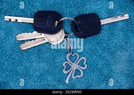 Bunch of keys with keychain close-up Stock Photo