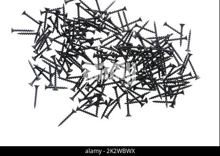 Black construction screws on wood on a white isolated background Stock Photo
