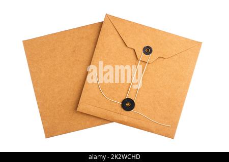 square craft paper envelopes with textile thread enclosing isolated on white Stock Photo