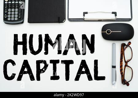 Handwriting text Human Capital. Business approach Intangible Collective Resources Competence Capital Education Flashy School Office Supplies, Teaching Learning Collections, Writing Tools Stock Photo