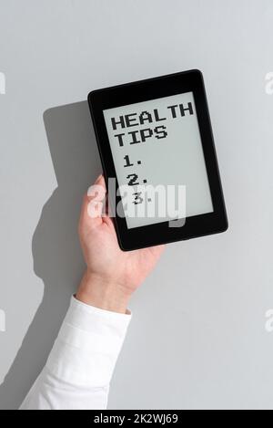 Text sign showing Health Tips. Word for state of complete physical mental and social well being -47168 Stock Photo
