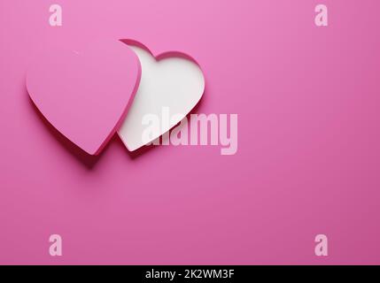 Open pink heart shaped gift box or package on a pink background Stock Photo