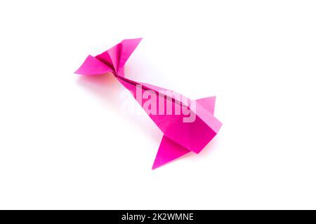 Pink paper fish origami isolated on a white background Stock Photo