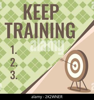 Text sign showing Keep Training. Concept meaning Grounding Drilling Always Wonder Be Curious Learn Target With Bullseye Representing Successfully Completed Project. Stock Photo