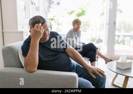 Upset senior couple at home having an argument Stock Photo