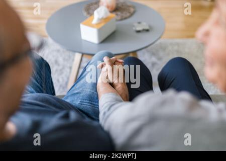 Happy romantic senior couple in love holding hands Stock Photo