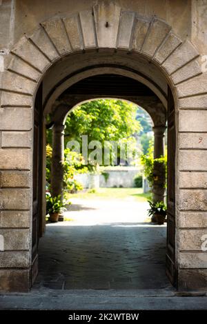 Arched passage in an old town Stock Photo