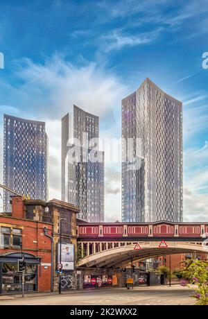 Bridgewater viaduct with the four towers of Deansgate Square in the distance. Manchester, UK. Stock Photo