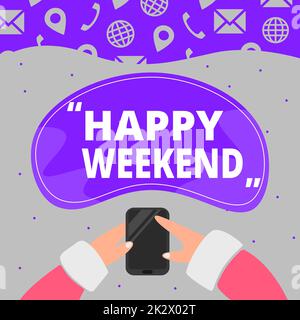 Conceptual caption Happy Weekend. Internet Concept Cheerful rest day Time of no office work Spending holidays Hand Holding Mobile Phone Pressing Application Button Showing Technology. Stock Photo