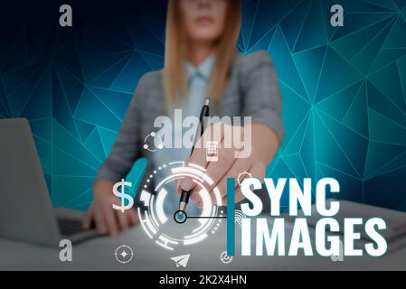 Conceptual display Sync Images. Concept meaning Making photos identical in all devices Accessible anywhere Lady in suit holding ballpoint pen representing innovative thinking. Stock Photo