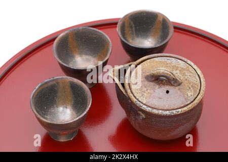 Japanese green tea in a tea set with cup and pot on wooden tray Stock Photo