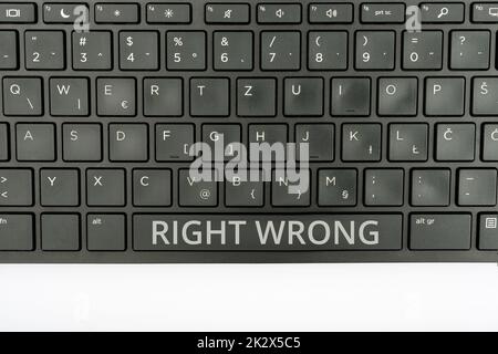 Handwriting text Right Wrong. Conceptual photo choose between two decisions correct and bad one to make Computer Keyboard And Symbol.Information Medium For Communication. Stock Photo