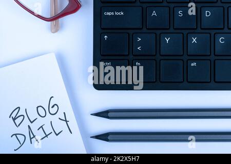 Text showing inspiration Blog Daily. Business concept Daily posting of any event via internet or media tools Computer Keyboard And Symbol.Information Medium For Communication. Stock Photo
