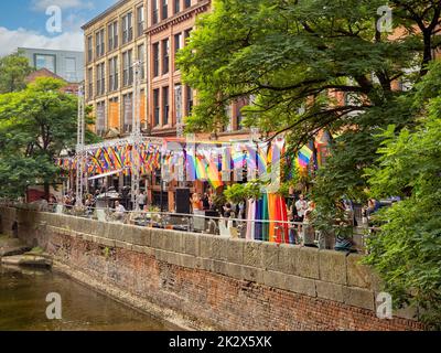 Alfresco dining in Canal Street, centre of Manchester's gay village seen from Minshull Street. UK Stock Photo