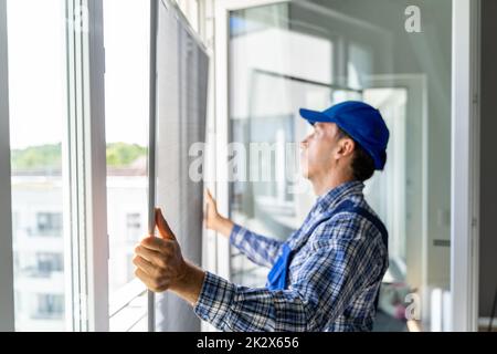 Mosquito Net Frame Install Service Stock Photo