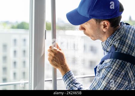 Mosquito Net Frame Install Service Stock Photo