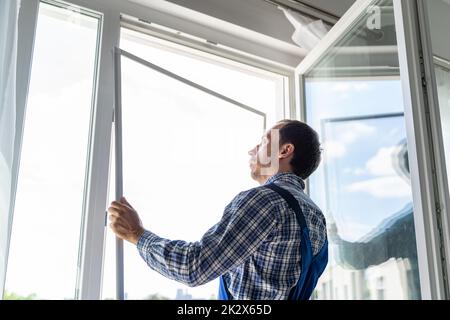 Mosquito Net Frame Install Service Stock Photo