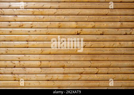 Background from a wall made of painted brown wooden planks Stock Photo