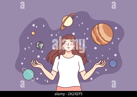 Happy girl meditate in imaginary universe Stock Photo