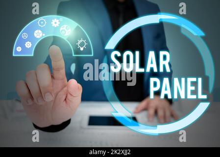 Text caption presenting Solar Panel. Concept meaning designed to absorb suns rays source of energy generating Businessman in suit pointing upwards representing innovative thinking. Stock Photo