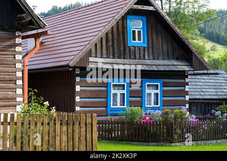 Old wooden houses in village Osturna, Spiska magura region, Slovakia Stock Photo