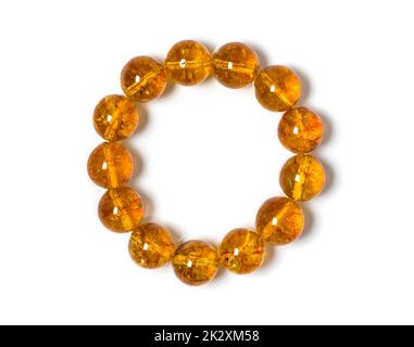 Citrine Jewel or gems bracelet on white background. Collection of natural gemstones accessories. Studio shot Stock Photo