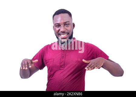 portrait of handsome happy young man gesturing hands while smiling at camera. Stock Photo