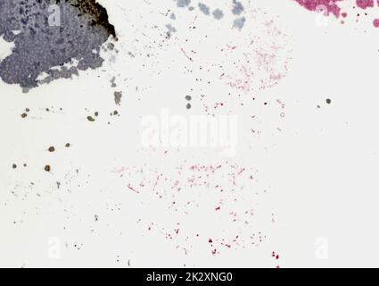 Large image close up of paper texture background scan with large colorful ink pink, purple, black, brown color stains, spots, dots and blotches wallpaper with copy space for text dirty used paper Stock Photo