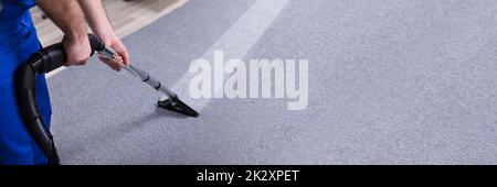 Janitor Cleaning Carpet Stock Photo