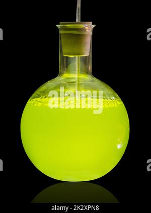 Laboratory flask isolated on black background Stock Photo