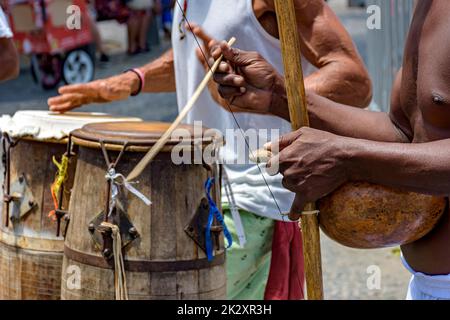 Berimbau and atabaque players during presentation of Brazilian capoeira Stock Photo