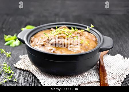 Goulash of beef in pan on black board Stock Photo
