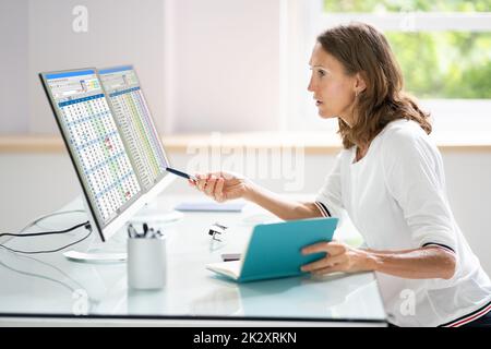 Analyst Working With Spreadsheet Business Data Stock Photo