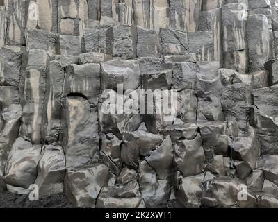 Amazing basalt rock structures at Endless Black Beach of Iceland. Stock Photo