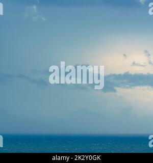 Dark blue clouds and sea. storm, dramatic seascape Stock Photo