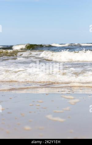 High and dangerous waves on the beach of Zempin on the island of Usedom on a beautiful day Stock Photo