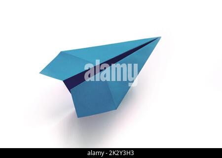 Blue paper plane origami isolated on a white background Stock Photo