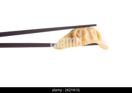 Chinese dumplings and chopsticks isolated on white background. Stock Photo